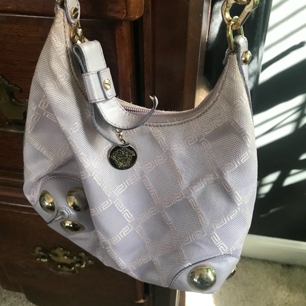 Givenchy light purple shoulder bag, comes with adjustable shoulders strap.